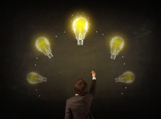 Businessman with lightbulbs over his head