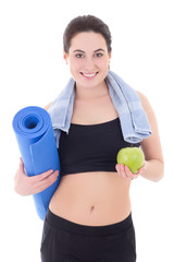 happy slim woman with yoga mat, towel and apple isolated on whit