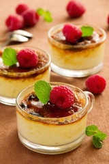 Creme brulee  with raspberries and mint.