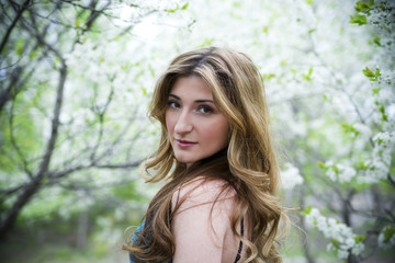 Naklejka premium Beautiful woman in garden.