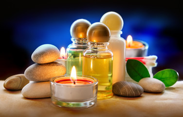 Spa stones, candle and shampoo