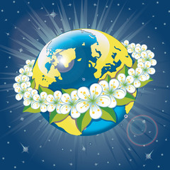 Planet earth with wreath of spring flovers.View from space