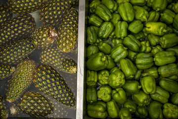 Pineapples and green paprika in water