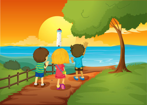 Three kids watching the lighthouse