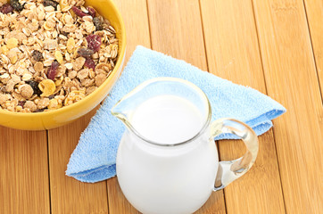 Delicious and healthy cereal in bowl with milk