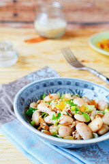 white beans with green onions, salad