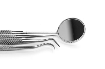 Basic dentist tools isolated on white