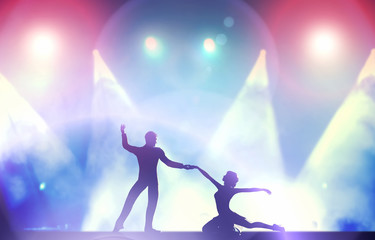 Obraz na płótnie Canvas A couple of dancers in elegant, passionate dancing pose in club