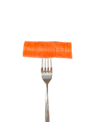Large piece of carrot pinned on a fork