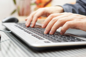 businessman  is typing on keyboard