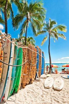 Surfboards in the rack at Waikiki Beach