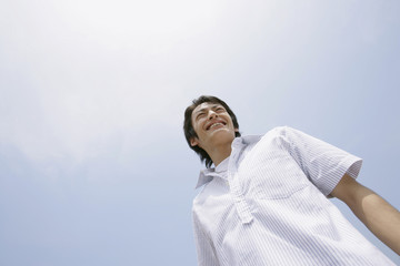 smiling man and blue sky