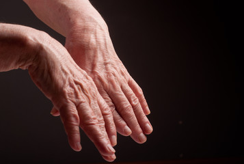 Senior hands. Suffering from pain and rheumatism