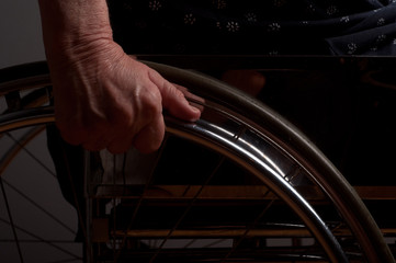 Hands Senior in wheelchair
