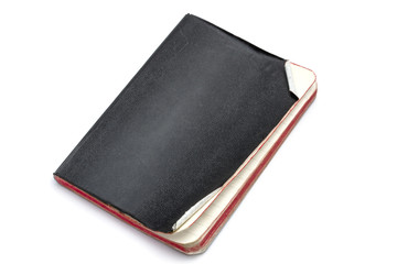 Black notebook isolated on white 