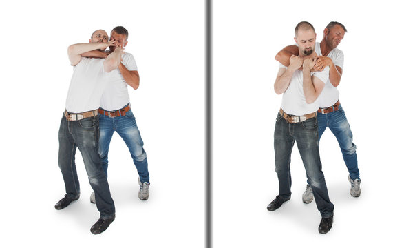 Man defending against a headlock