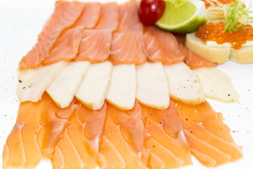 cutting of the fish on the table in a restaurant