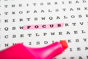 Text marker on word puzzle - focus
