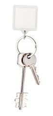 two house keys and square keychain on ring