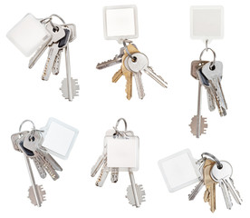set of bunch of door keys with blank keychain