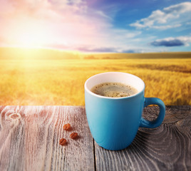 cup of morning coffee at sunrise