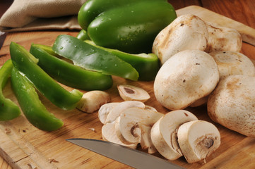Sliced mushrooms and green peppers