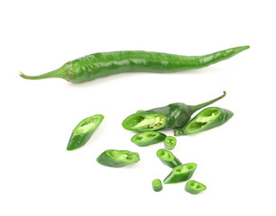 Whole and slices of green pepper.