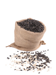 Close up of black sunflower seeds in bag.