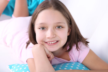 Beautiful little girl sitting
