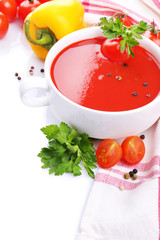 Tasty tomato soup and vegetables, isolated on white