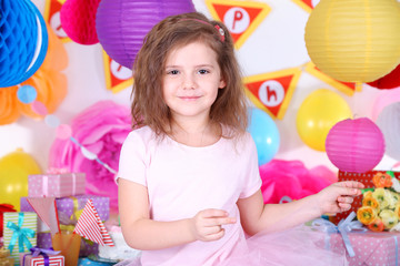 Fototapeta na wymiar Pretty little girl celebrate her birthday