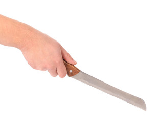 Hand holds knife for bread.