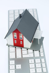 Wohnhaus auf Tastatur
