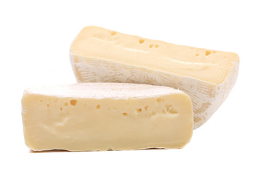 Two pieces of cheese brie.