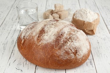Composition with rye bread on wooden background