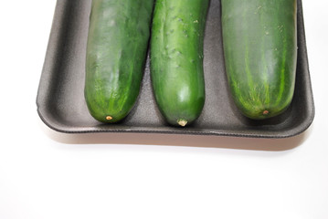 Three Cucumbers in a Produce Package