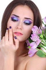Fototapeta premium Beautiful young woman with flowers close up