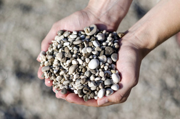 Pebbles in hands
