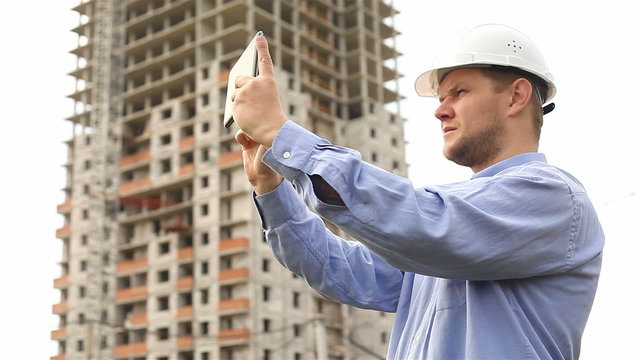 construction engineer with the tablet. pictures