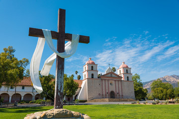 Mission Santa Barbara with cross and sky blue background - obrazy, fototapety, plakaty