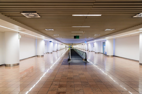 Interior of a modern terminal in international airport with esca