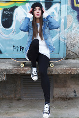 Urban girl with skateboard