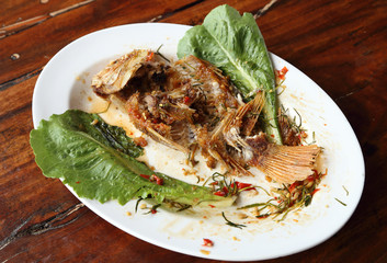 eaten Fried ruby fish topped with sweet,sauer and hot sauce