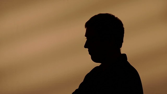 Male silhouette talking