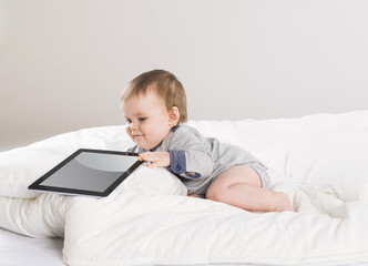 Baby with digital tablet