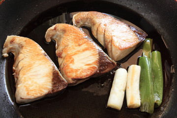 japanese cooking, Yellow tail on pan with teriyaki sauce
