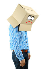 Man with cardboard box on his head isolated on white