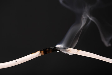 Short circuit, burnt cable, isolated on black