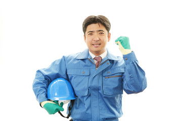 ガッツポーズの作業員