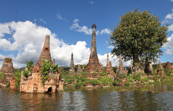 Ancient flooded pagodas in ruins near Samkar village on Inle lake, Shan state, Myanmar
